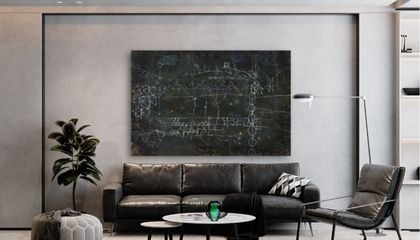 Hamburg print — dark blackboard-like abstract framed above a sofa