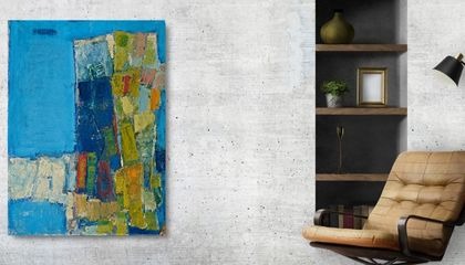 Liverpool print — blue and ochre abstract beside a leather armchair